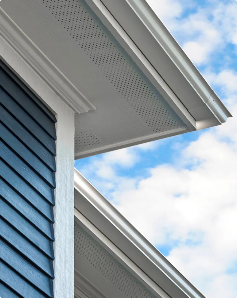 HardieSoffit vented panels on eave of home with Deep Ocean HardiePlank siding
